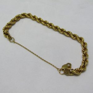 Pulsera tipo cordón, en Oro de 18k. 11,35 gr.