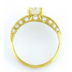 Sortija en Oro de 18k. con Diamante Talla Brillante de 1.26 ct. L-P1 (Certificado IGE) y 26 Brillantes de 0,9 ct. aprox.