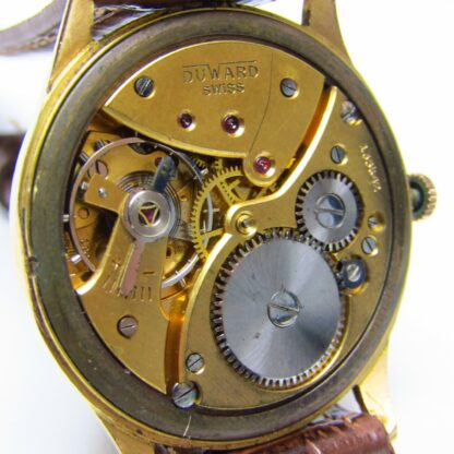 DUWARD Antimagnetic. Reloj de pulsera para caballero. Oro 18k. Acero. Suiza, ca. 1955.