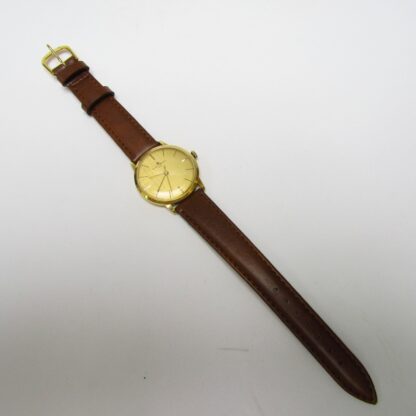 BAUME & MERCIER. Reloj de pulsera para caballero. Oro 18k. Geneve, Suiza, ca. 1960