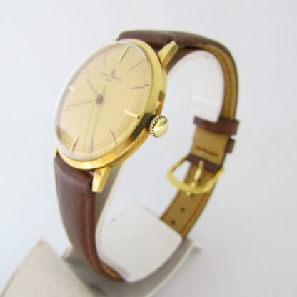 BAUME & MERCIER. Reloj de pulsera para caballero. Oro 18k. Geneve, Suiza, ca. 1960