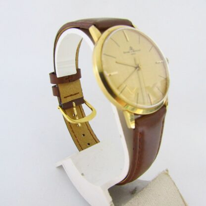 BAUME & MERCIER. Reloj de pulsera para caballero. Oro 18k. Geneve, Suiza, ca. 1960