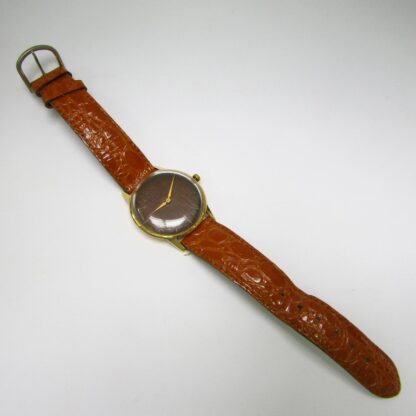 Buwat (Buser Frères & Co.). Reloj de pulsera para caballero. Oro 18k. Suiza, ca. 1970.