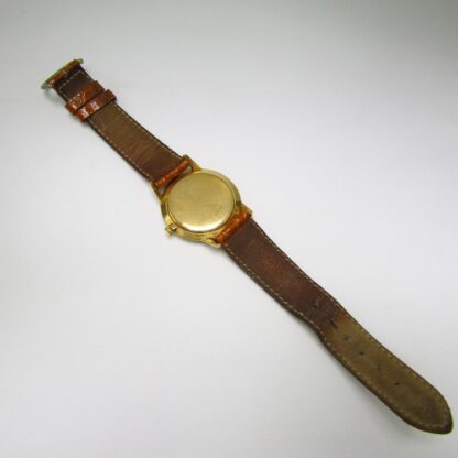 Buwat (Buser Frères & Co.). Reloj de pulsera para caballero. Oro 18k. Suiza, ca. 1970.