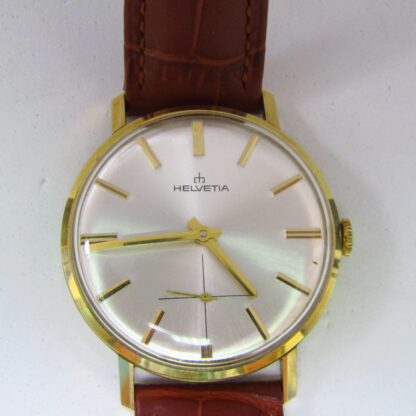 HELVETIA. Reloj de pulsera para caballero. Oro 14k. Suiza, 1978.