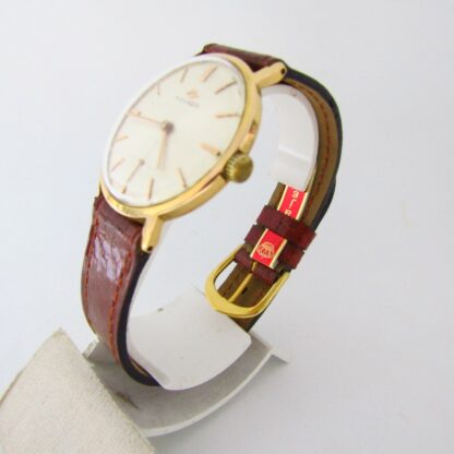 MOVADO. Reloj de pulsera para caballero. Oro 18k. Ca. 1950-1960.