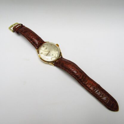 LONGINES. Reloj de pulsera para caballero. Oro 18k. Suiza, 1950.